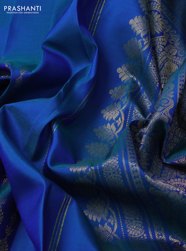 Pure kanchipuram silk saree dual shade of cs blue with zari woven buttas and long zari woven border