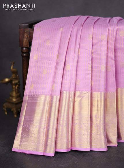Pure kanchipuram silk saree light pink with allover zari checks & buttas and long zari woven border