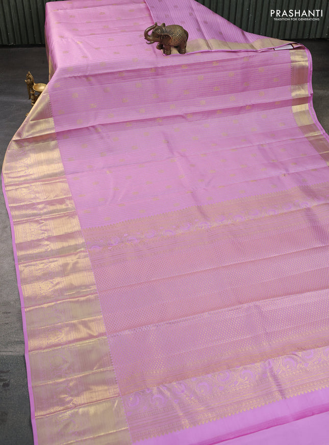 Pure kanchipuram silk saree light pink with allover zari checks & buttas and long zari woven border
