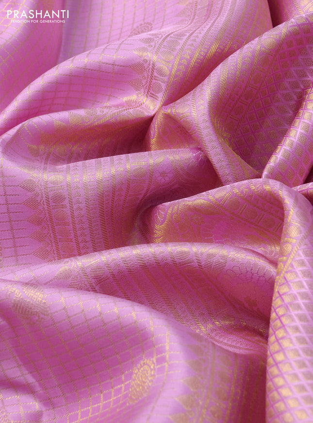 Pure kanchipuram silk saree light pink with allover zari checks & buttas and long zari woven border