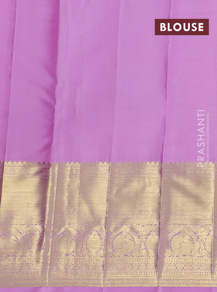 Pure kanchipuram silk saree light pink with allover zari checks & buttas and long zari woven border
