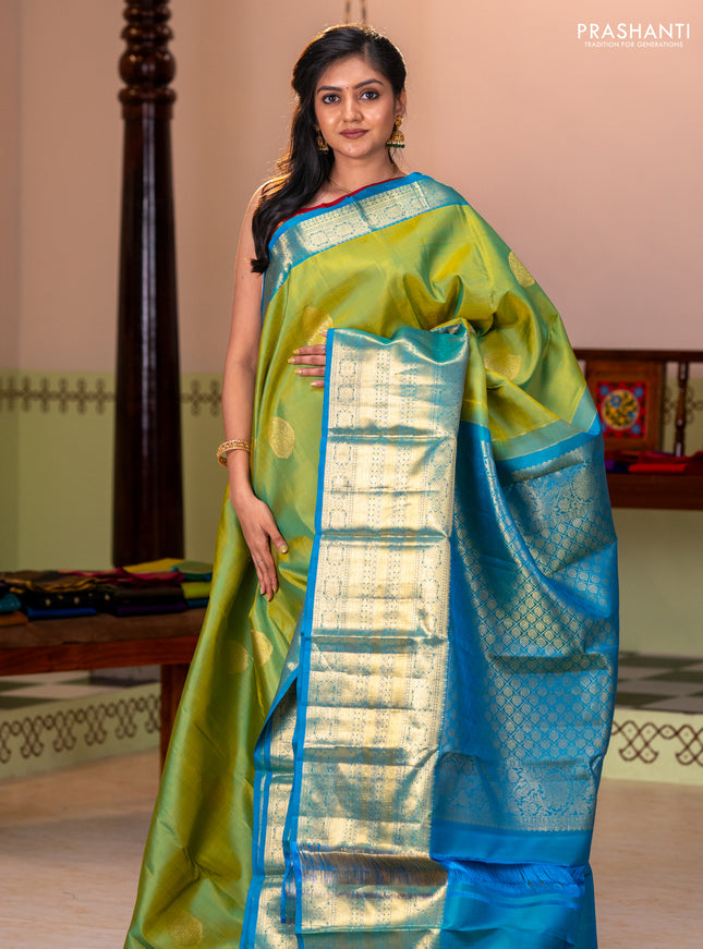 Pure kanchipuram silk saree light green and teal blue with zari woven buttas and long zari woven border