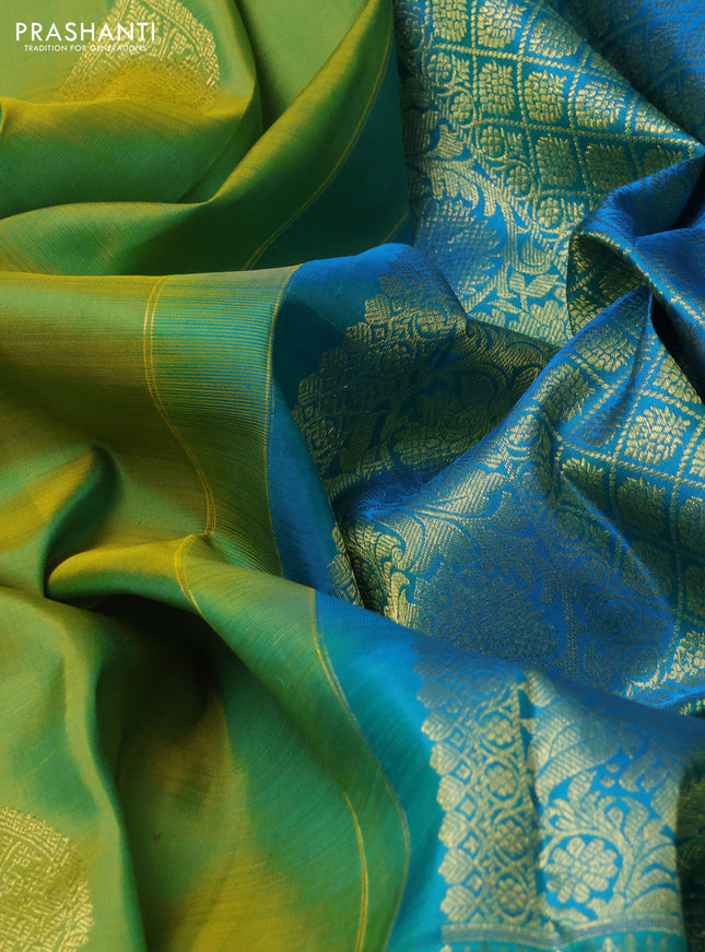 Pure kanchipuram silk saree light green and teal blue with zari woven buttas and long zari woven border