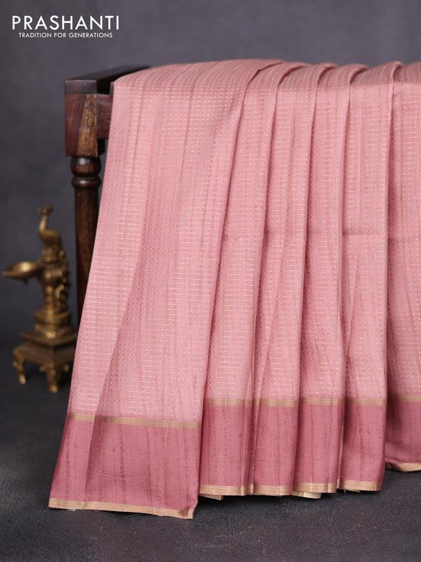 Semi matka saree pastel peach with allover zari weaves and rettapet zari woven border