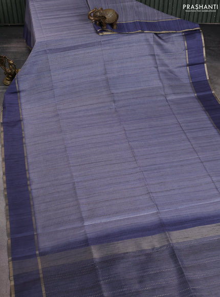 Semi matka saree blue shade with allover zari weaves and rettapet zari woven border
