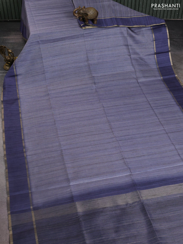 Semi matka saree blue shade with allover zari weaves and rettapet zari woven border