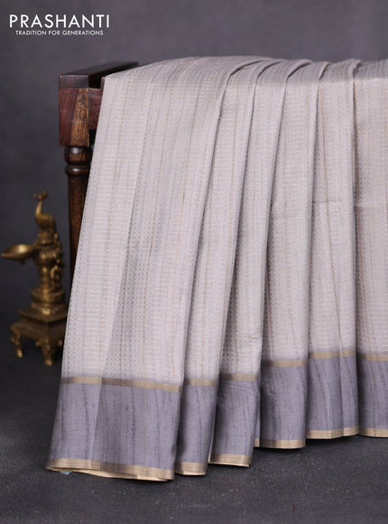 Semi matka saree grey with allover zari weaves and rettapet zari woven border