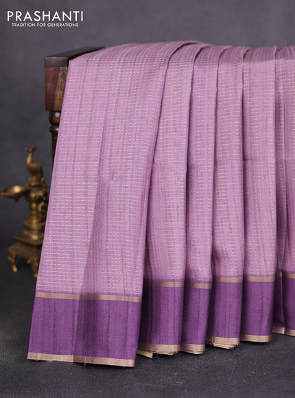 Semi matka saree purple with allover zari weaves and rettapet zari woven border