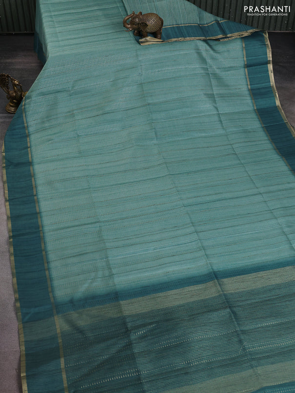 Semi matka saree teal green with allover zari weaves and rettapet zari woven border