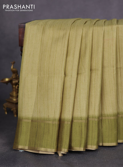 Semi matka saree mehendi green with allover zari weaves and rettapet zari woven border
