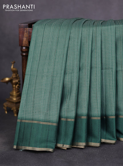 Semi matka saree peacock green with allover zari weaves and rettapet zari woven border