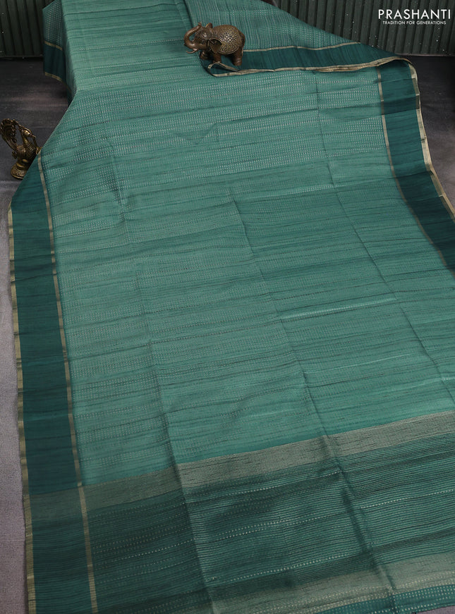 Semi matka saree peacock green with allover zari weaves and rettapet zari woven border