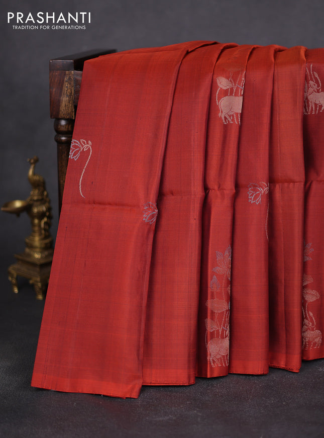 Pure soft silk saree rust shade with pichwai zari woven buttas In borderless style