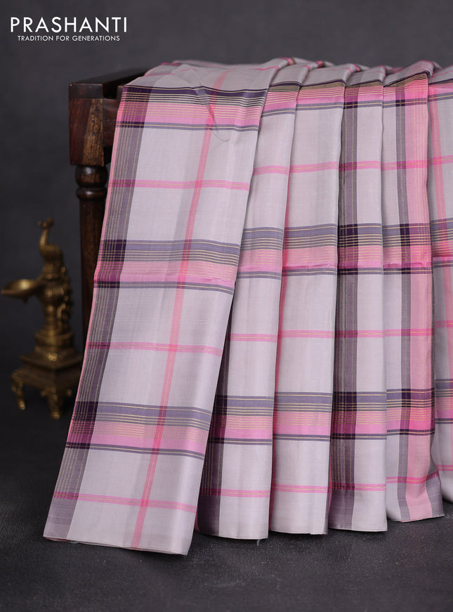 Pure soft silk saree pastel grey and peach pink with allover zari checked pattern In borderless style