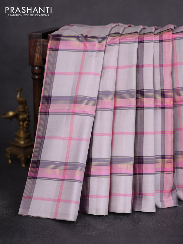 Pure soft silk saree pastel grey and peach pink with allover zari checked pattern In borderless style