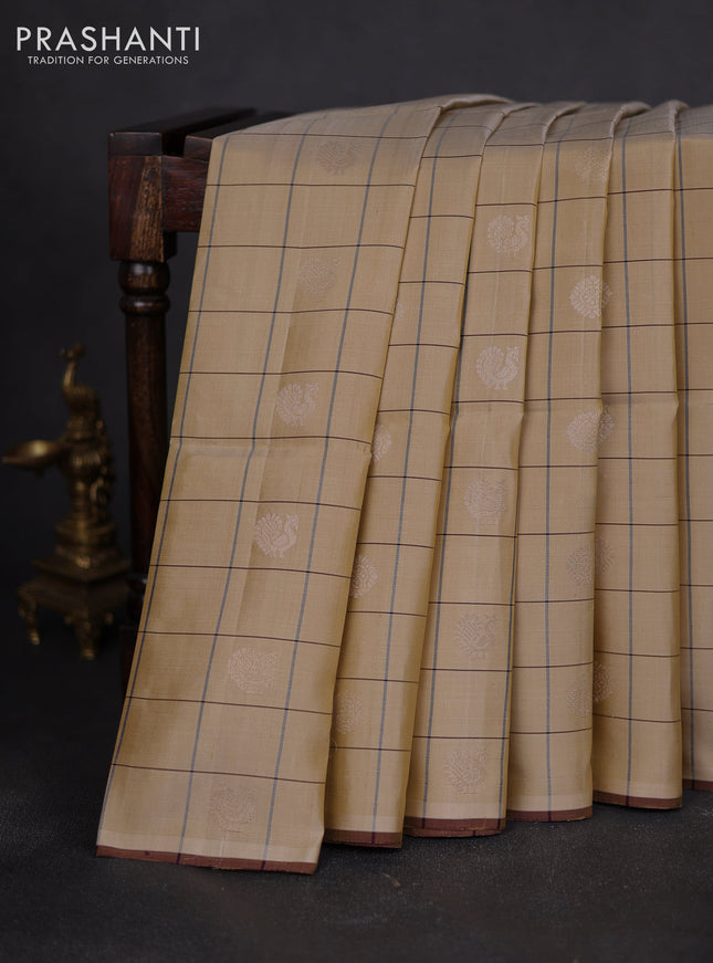 Pure soft silk saree sandal and deep purple with allover checks & zari buttas and piping border