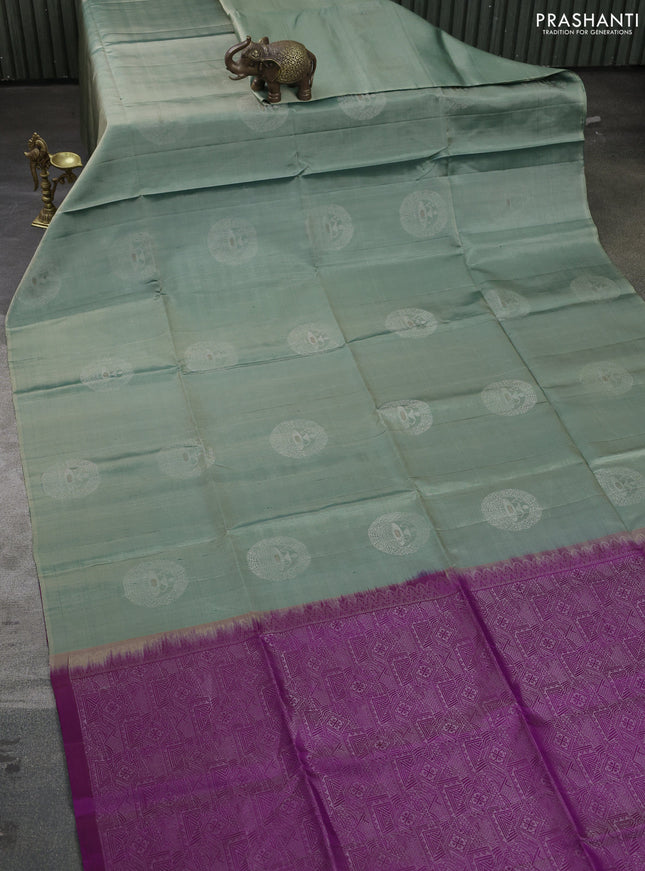 Pure soft silk saree pastel green and purple with silver zari woven warli buttas in borderless style