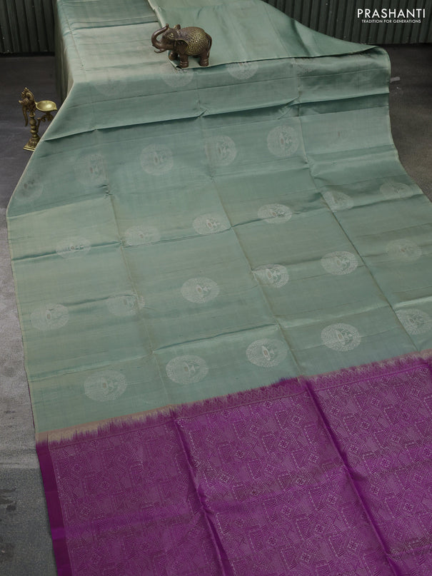 Pure soft silk saree pastel green and purple with silver zari woven warli buttas in borderless style