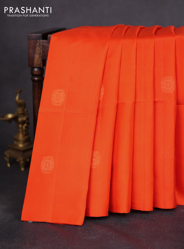Pure soft silk saree orange and multi colour with zari woven buttas and small katams pallu