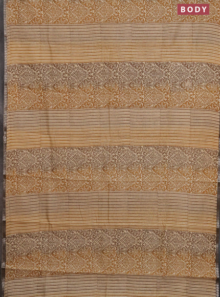 Chanderi silk cotton saree sandal and brown with allover prints and small zari woven border