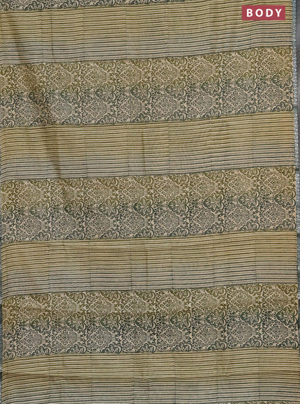 Chanderi silk cotton saree sandal and green with allover prints and small zari woven border