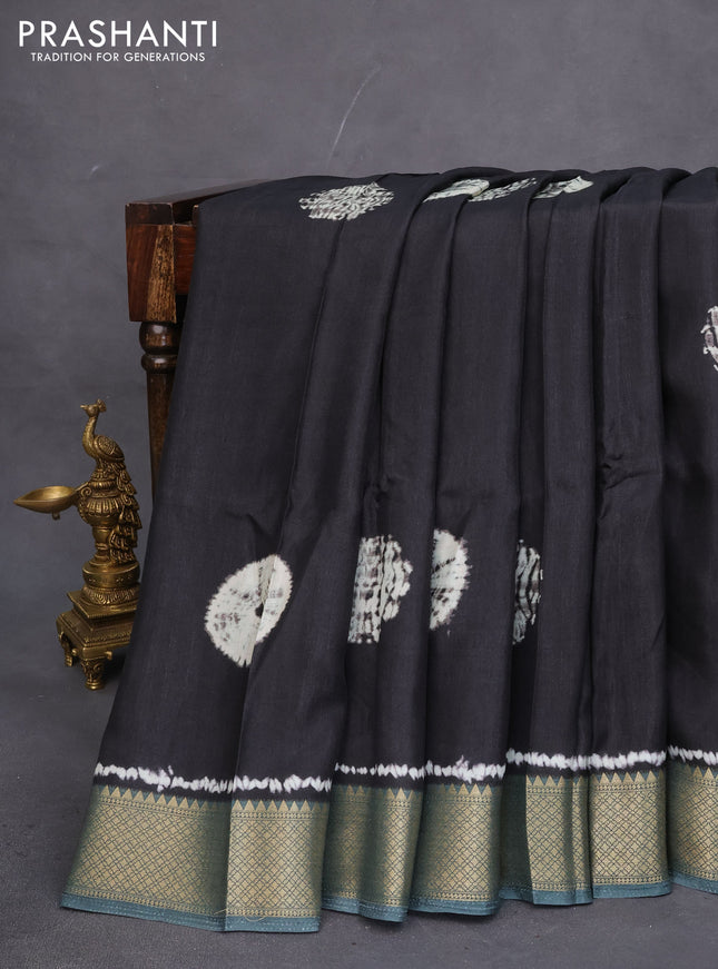 Semi crepe saree black and greyish green with shibori butta prints and kalamkari printed pallu & zari border