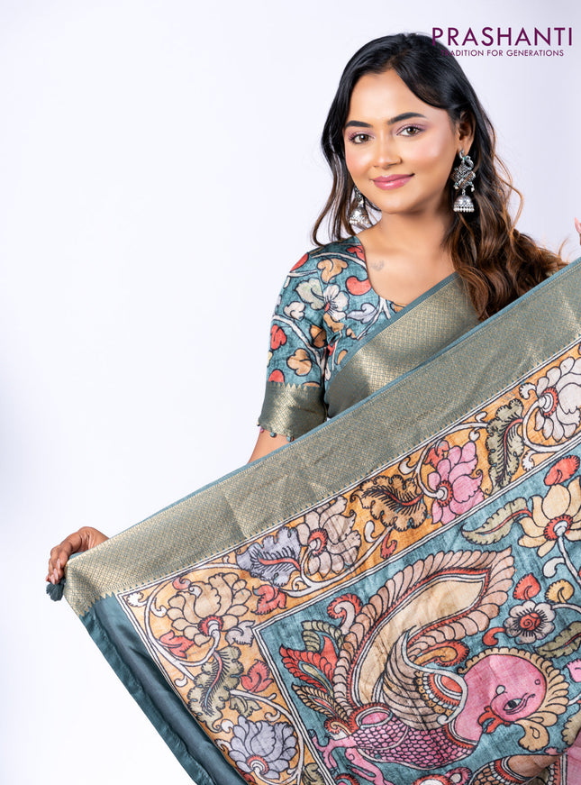 Semi crepe saree black and greyish green with shibori butta prints and kalamkari printed pallu & zari border