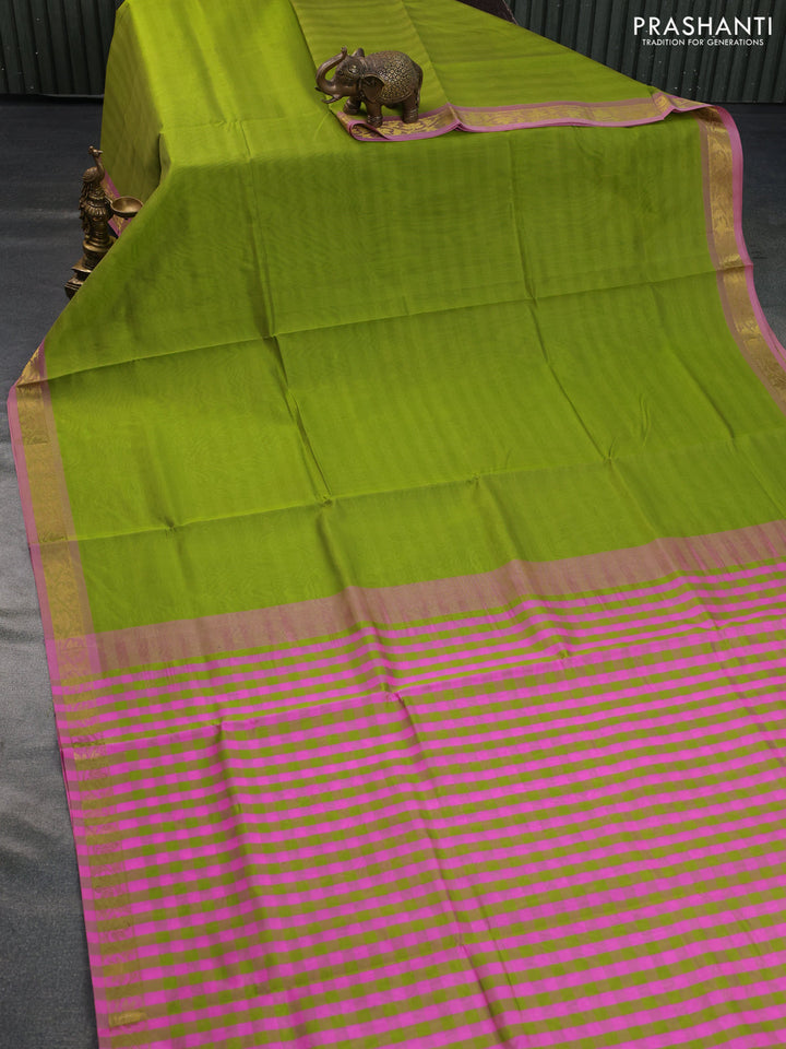 Silk cotton saree light green and light pink with plain body and zari woven border