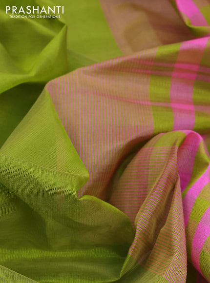 Silk cotton saree light green and light pink with plain body and zari woven border