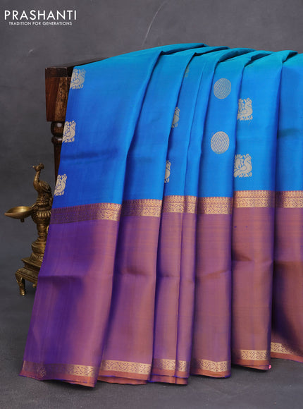 Pure soft silk saree dual shade of bluish green and dual shade of rust with annam & rudhraksha zari woven buttas and long rettapet zari woven border