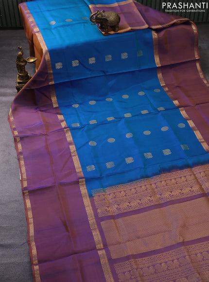 Pure soft silk saree dual shade of bluish green and dual shade of rust with annam & rudhraksha zari woven buttas and long rettapet zari woven border