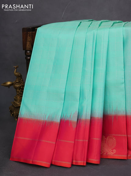Pure soft silk saree teal shade and dual shade of pinkish orange with allover silver zari checked pattern and zari woven butta border