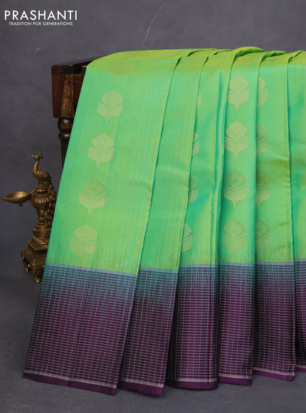Pure soft silk saree green and dark purple with allover zari stripe & buttas and silver zari woven checked border