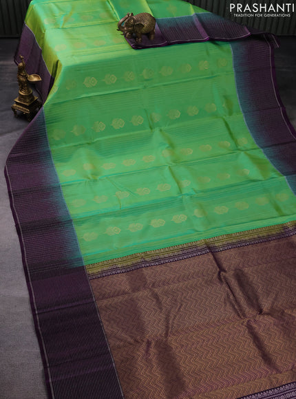 Pure soft silk saree green and dark purple with allover zari stripe & buttas and silver zari woven checked border