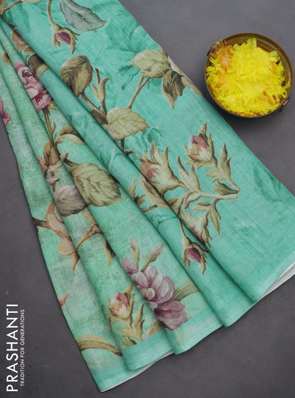 Linen cotton saree teal green with allover floral digital prints and simple border