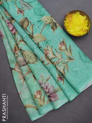 Linen cotton saree teal green with allover floral digital prints and simple border