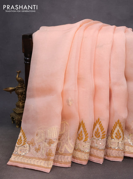 Pure organza silk saree peach shade with embroidery work buttas and kantha stitch work border
