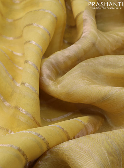 Pure organza silk saree yellow with allover zari weaves and embroidery work border