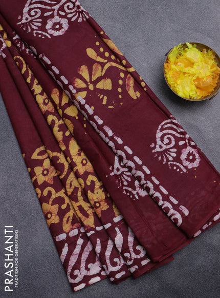 Batik cotton saree deep marron and mustard yellow with batik prints and long printed border
