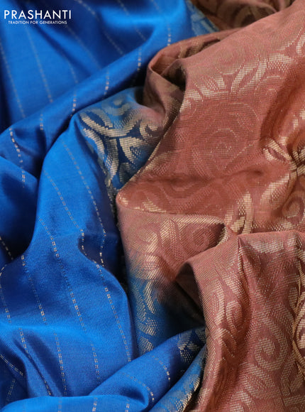 Kanchipuram soft silk saree peacock blue and pastel brown with allover zari weaves and piping border