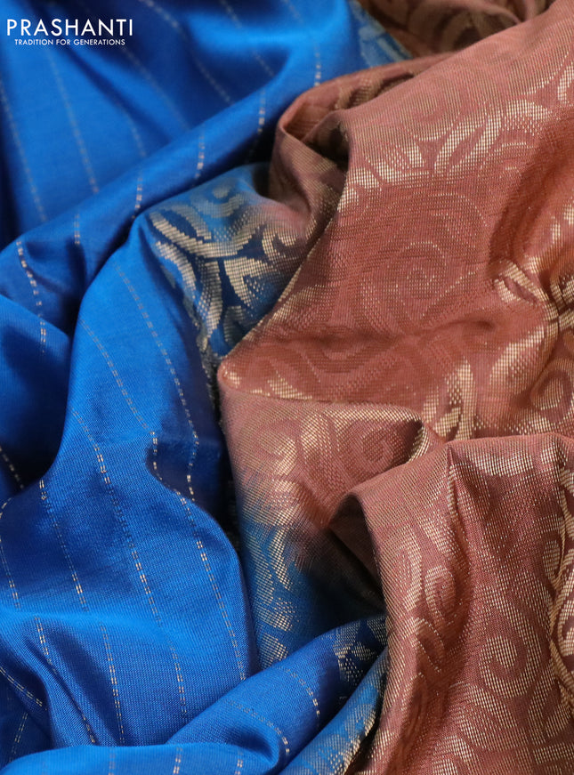 Kanchipuram soft silk saree peacock blue and pastel brown with allover zari weaves and piping border