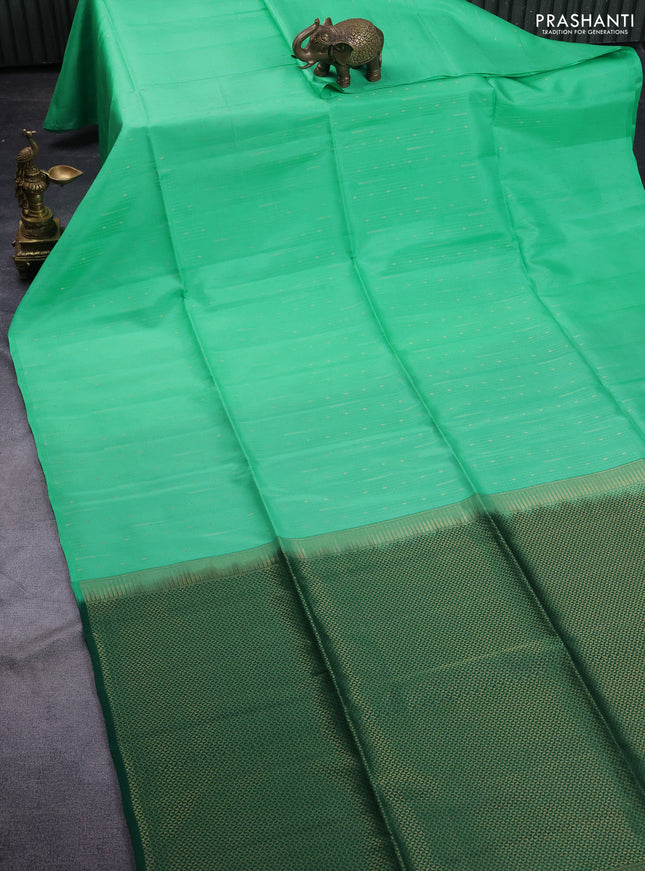 Kanchipuram soft silk saree teal green shade and green with allover zari weaves in borderless style