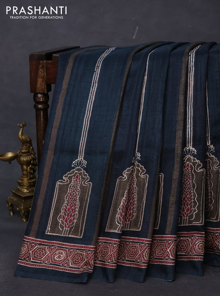 Semi tussar saree dark peacock green with allover ajrakh prints and printed border