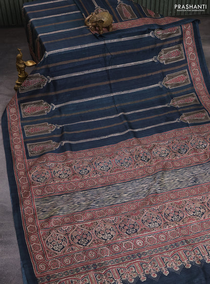 Semi tussar saree dark peacock green with allover ajrakh prints and printed border