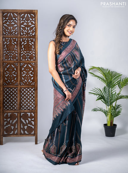 Semi tussar saree dark peacock green with allover ajrakh prints and printed border