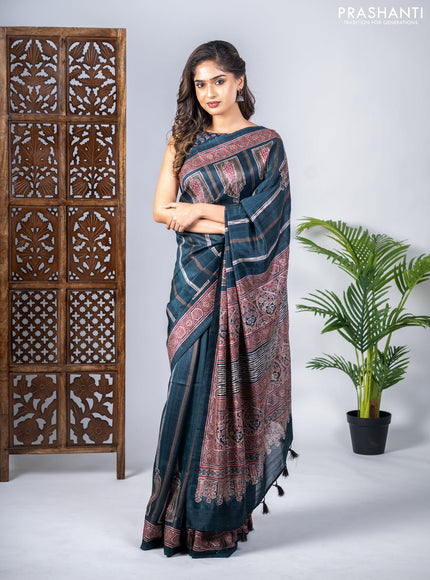 Semi tussar saree dark peacock green with allover ajrakh prints and printed border