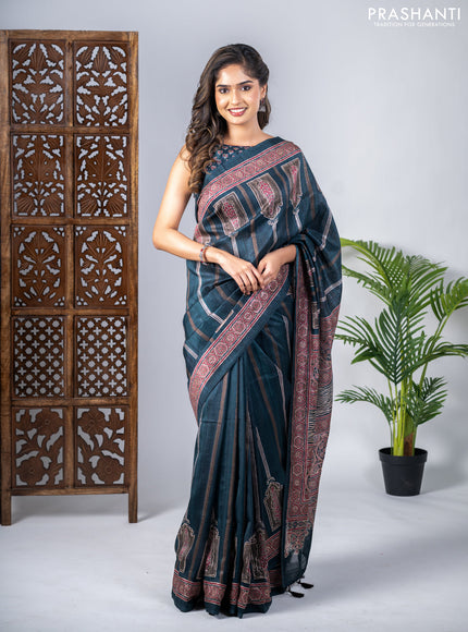 Semi tussar saree dark peacock green with allover ajrakh prints and printed border