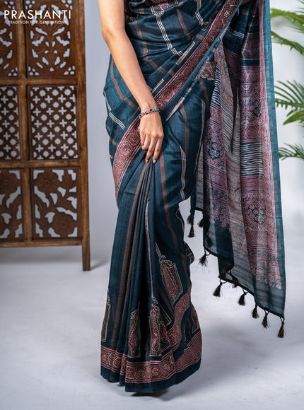 Semi tussar saree dark peacock green with allover ajrakh prints and printed border