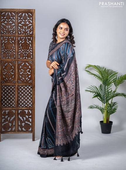 Semi tussar saree black with allover ajrakh prints and printed border