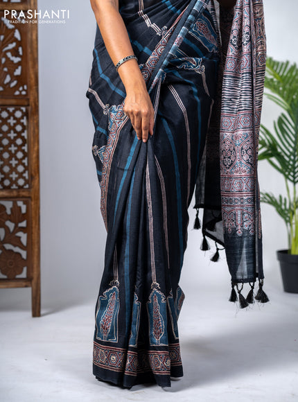 Semi tussar saree black with allover ajrakh prints and printed border